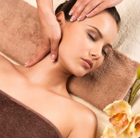 contact-s2-beautiful-young-woman-relaxing-with-head-massage-8JQUYL4.jpg
